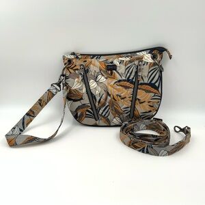 Lug Swivel Convertible Crossbody Bag. In Lily Grey. Good Pre-Owned Condition.